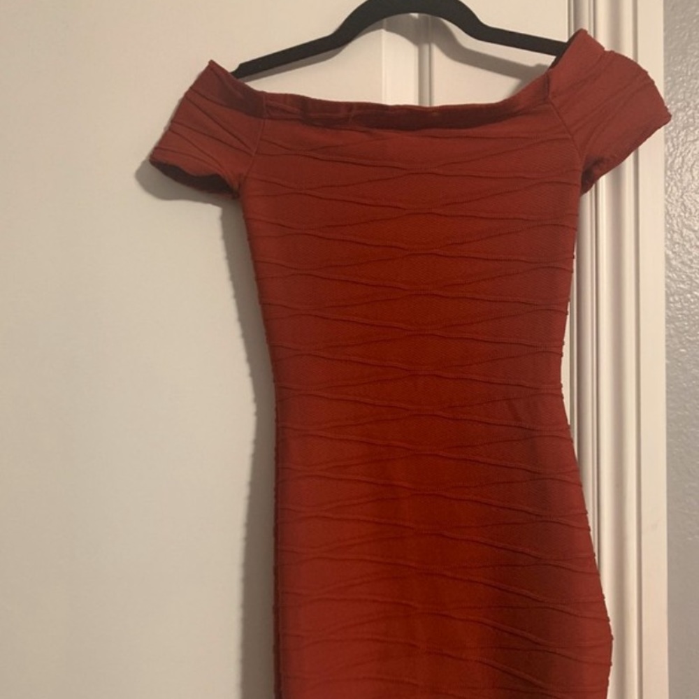 Orange tight fitting dress